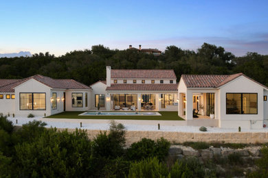 Inspiration for a mediterranean exterior home remodel in Austin