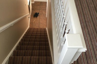 Striped stair carpet with LVT risers