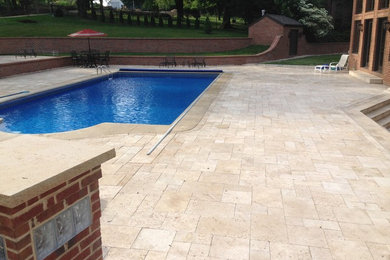 Pool - mid-sized traditional backyard tile and custom-shaped pool idea in Other