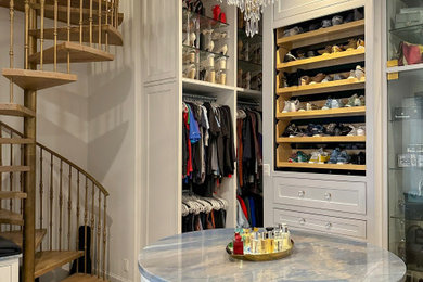 Example of a transitional closet design in Houston