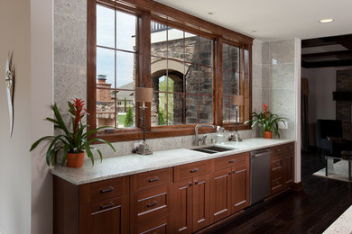Example of a large transitional u-shaped dark wood floor and brown floor eat-in kitchen design in Columbus with a double-bowl sink, shaker cabinets, medium tone wood cabinets, quartzite countertops, stone tile backsplash, stainless steel appliances and an island