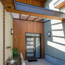 front door and  glass overhang