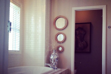 Example of a mid-sized trendy master gray tile and porcelain tile porcelain tile bathroom design in Calgary with shaker cabinets, light wood cabinets, quartzite countertops, a one-piece toilet, an undermount sink and beige walls