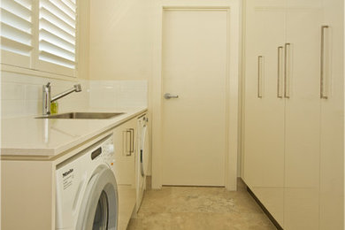 Design ideas for a mediterranean laundry room in Adelaide.