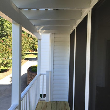 Clemmons, NC Eze Breeze Window Room with Double White Aluminum Pergolas.