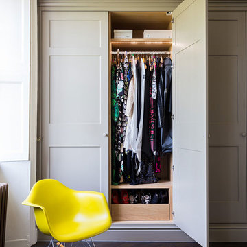 Traditional fitted wardrobes and parquet flooring