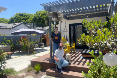 Patio - mid-sized contemporary side yard concrete patio idea in Los Angeles with a pergola