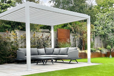 This is an example of a contemporary patio in Sussex.
