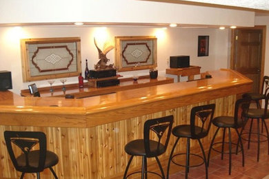 Example of a home bar design in Milwaukee