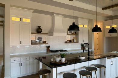 Example of a transitional home design design in Salt Lake City