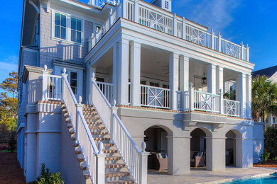 Inspiration for a gray three-story exterior home remodel in Other