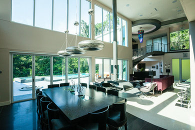 Inspiration for a mid-sized contemporary porcelain tile great room remodel in Orlando with beige walls