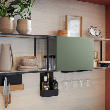 Cuisine dernière génération avec agencements astucieux et façades mates grises.