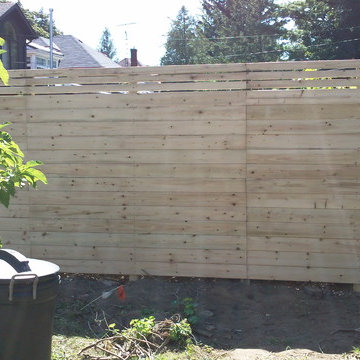 Modern take on traditional privacy fence; horizontal