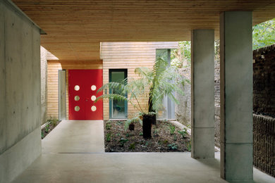 This is an example of a contemporary house exterior in London with wood cladding.