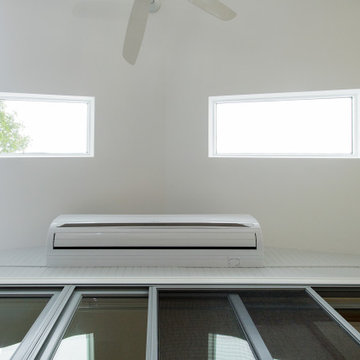 A Nature-Infused Home Addition with Ambient Lighting