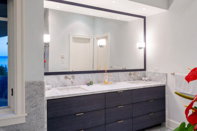 Large arts and crafts master white tile and marble tile double-sink bathroom photo in Vancouver with furniture-like cabinets, black cabinets, a bidet, an undermount sink, marble countertops, white countertops and a built-in vanity