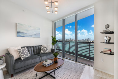 Inspiration for a small contemporary living room remodel in Miami with no fireplace and no tv