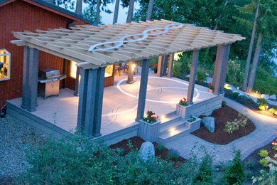 Photo of a large contemporary backyard patio in Other with a container garden, decking and a pergola.
