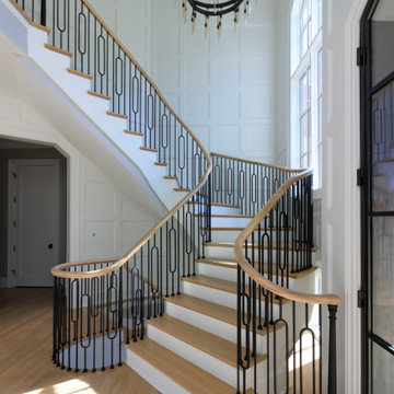 Project #95 | Freestanding Elliptical Staircase with Geometric Iron Balusters