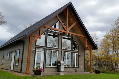 Rustic exterior home idea in Other