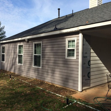 Charlotte, NC, upscale vinyl siding replacement by Belk Builders.