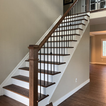 Red Oak floors, stairs, and handrail