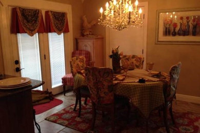 Example of a mid-sized classic home design design in Other