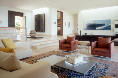 This is an example of a contemporary living room in San Diego with white walls.