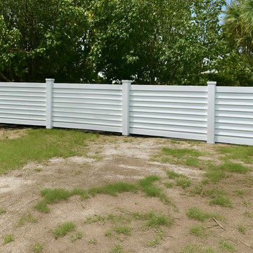 White vinyl fence