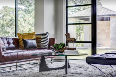 Inspiration for a large contemporary open concept dark wood floor and brown floor family room remodel in Dallas with white walls