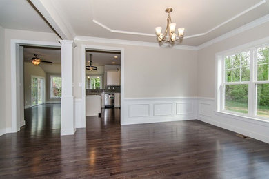 Inspiration for a craftsman medium tone wood floor dining room remodel in Philadelphia with beige walls