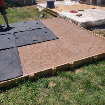 Stamped concrete, cedar deck