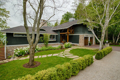 Photo of a mid-sized craftsman front yard landscaping in Other.