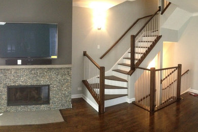 Example of a large trendy wooden curved staircase design in Chicago with wooden risers