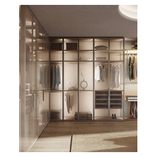 Walk in Closet Featuring Tall Glass Framed Cabinets - Modern - Closet ...