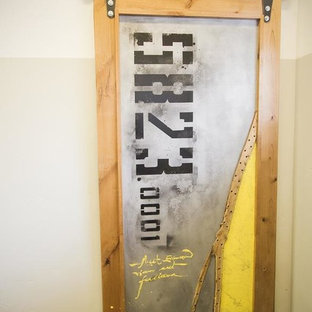 ソルトレイクシティのインダストリアルスタイルのおしゃれなホームジムの写真