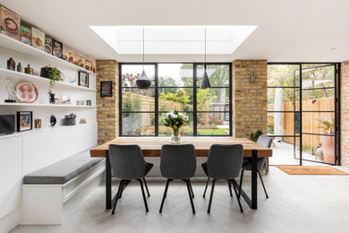Dining room - contemporary dining room idea in London