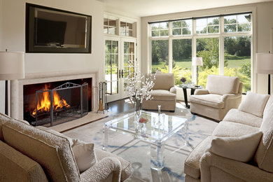 Example of a mid-sized classic dark wood floor and brown floor living room design in Milwaukee with black walls, a standard fireplace, a stone fireplace and a wall-mounted tv