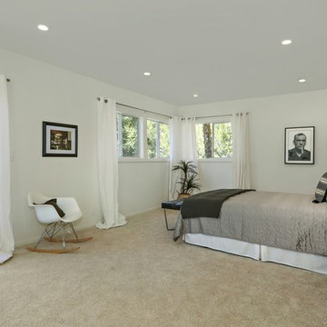 Contemporary art and end tables, Eames replica rocking chair