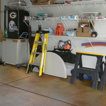 Dark Stains Hide Minor Imperfections in Garage Floor