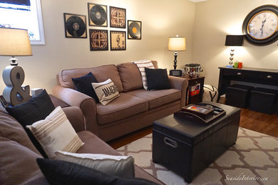 This is an example of a mid-sized eclectic basement in Other with beige walls and medium hardwood floors.