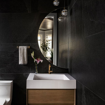 Dramatic Black Powder Room with Floating Vanity