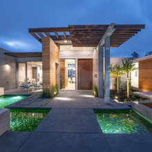 Pool in front of house