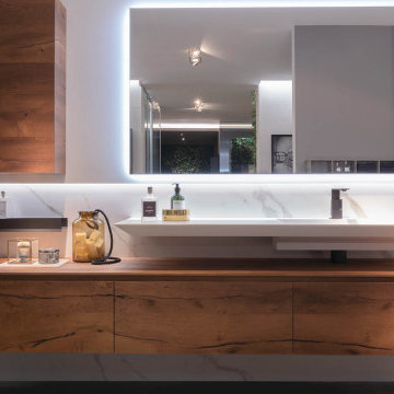 Bathroom countertop, basin and backsplash in Calacatta Oro Venato - I Naturali s