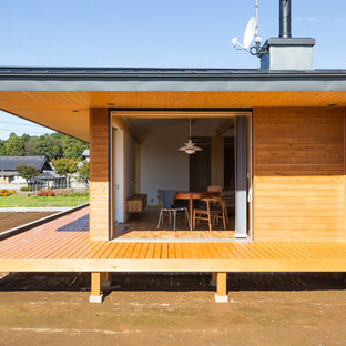 他の地域のコンテンポラリースタイルのおしゃれなデッキ (張り出し屋根) の写真