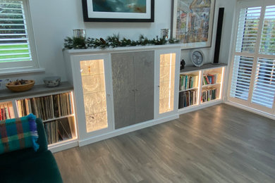 Example of a mid-sized trendy vinyl floor kitchen/dining room combo design in Cambridgeshire with white walls