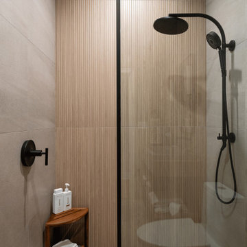 Curbless Walk-In Shower with Fluted Wood-Look Porcelain Tile