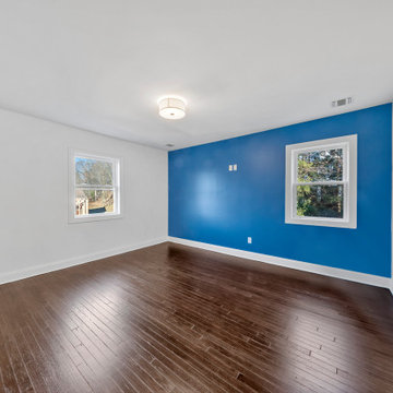 Bedroom With Bold Blue Accent Wall | Gut Remodel Haworth NJ