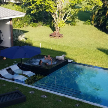 Modern pool with custom recycled glass mosaic combination